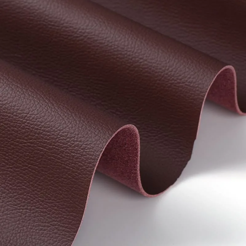 Wine-red microfiber synthetic leather with fine litchi-grain surface and brushed suede backing
