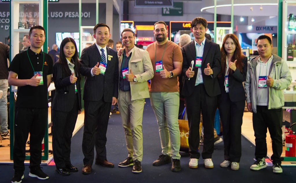 The MNT (MEINAITE) team together with official Brazil distribution partner AVI Importações at the Future Print 2026 trade show booth in São Paulo, Brazil.