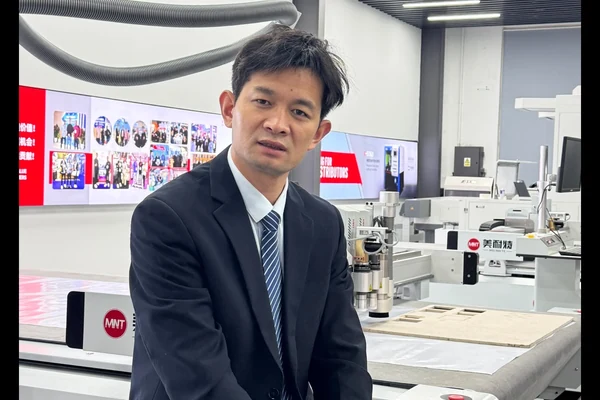 Mr Liu, founder of MNT MEINAITE cutting machine manufacturer