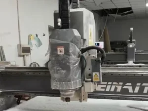 MNT MEINAITE T5 CNC router milling a thick PTFE Teflon plate at a customer workshop