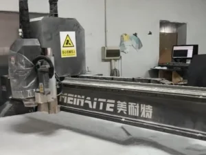 MNT MEINAITE T5 CNC router cutting a thick PTFE Teflon plate at a customer workshop