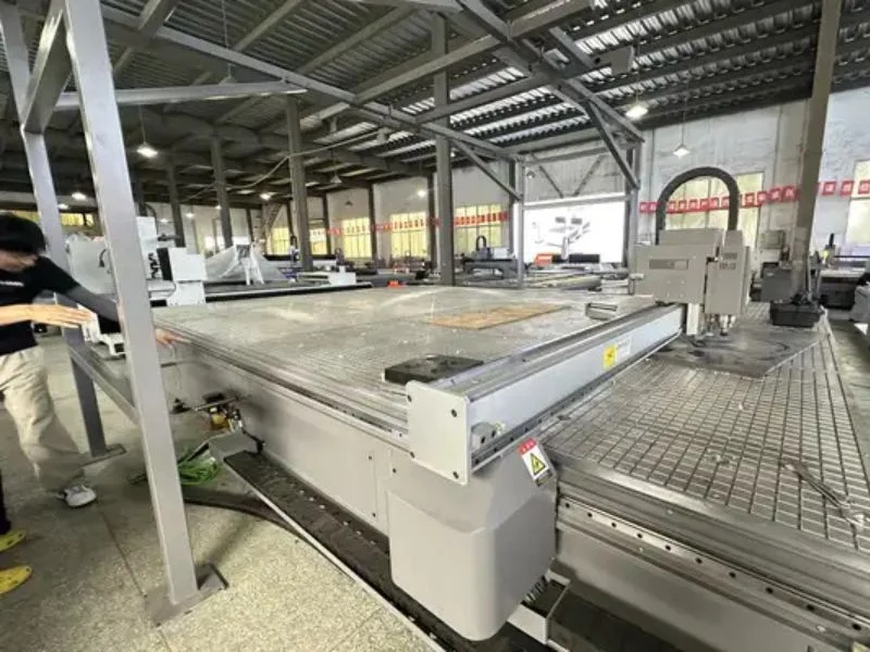 Large square-bed CNC digital flatbed cutter with vacuum grid table on the MNT factory floor