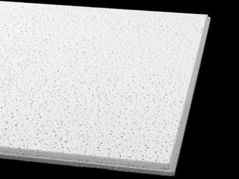 Bevelled mineral-wool acoustic panels cut clean on the MNT C-series knife table