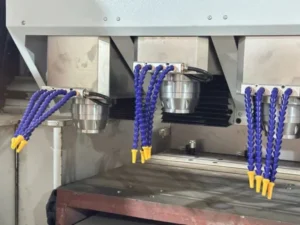 CNC router cutting acrylic material for custom sign making