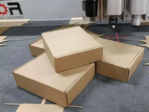 Die-less digital cardboard cutting machine producing foldable box samples for packaging prototyping