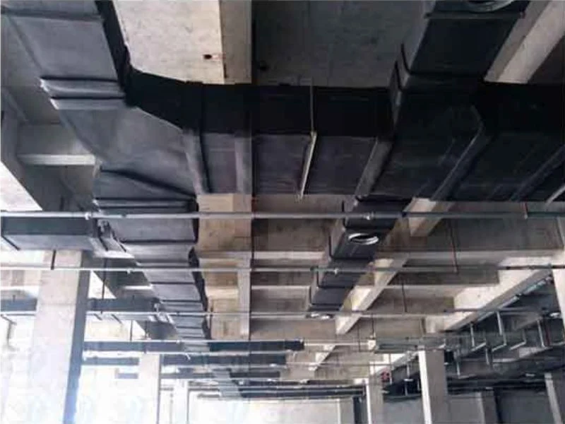 Nested HVAC duct-liner parts labelled in install order on the MNT cutting table