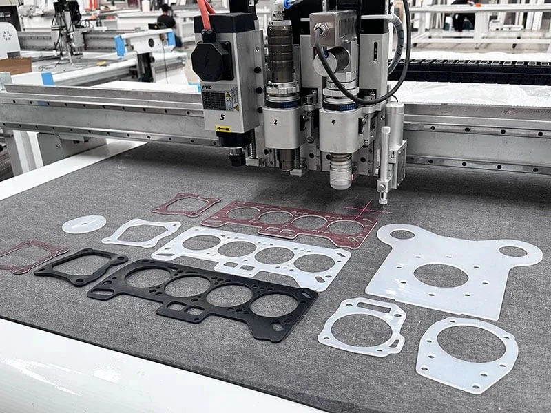 CNC router cutting PTFE plate with clean, fuzz-free edge using sharp high-rake tool