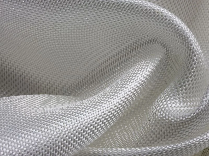 Drag blade shearing woven glass roving on the MNT C2516T vacuum table