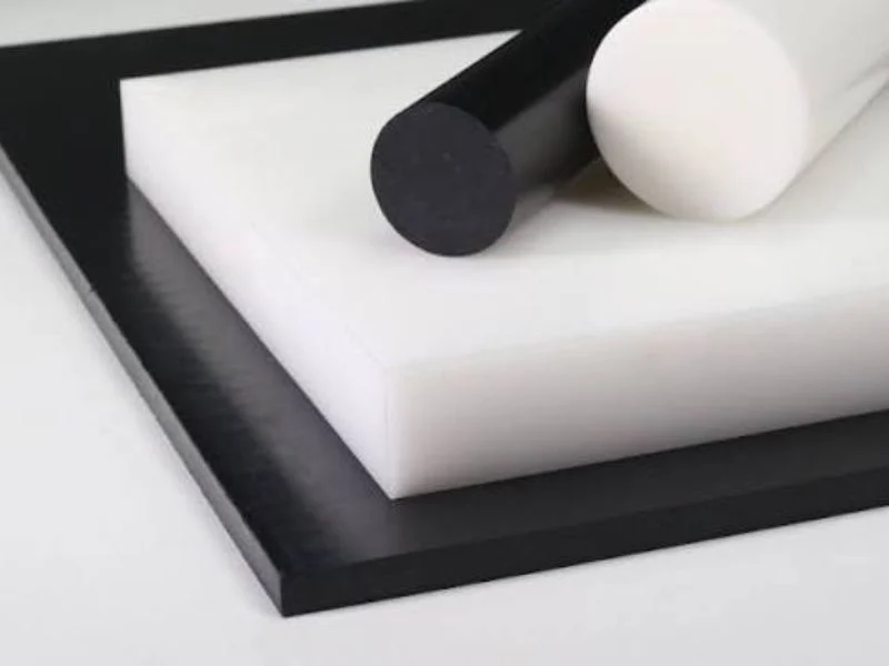 Black and natural acetal copolymer sheet stock labelled by grade