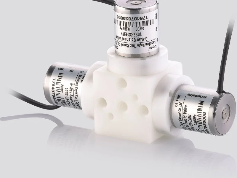 Machined acetal manifold showing deep bores and cross-drillings