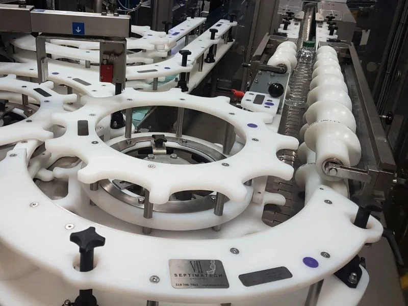 Acetal star wheel and guide rails machined as change parts for a filling line