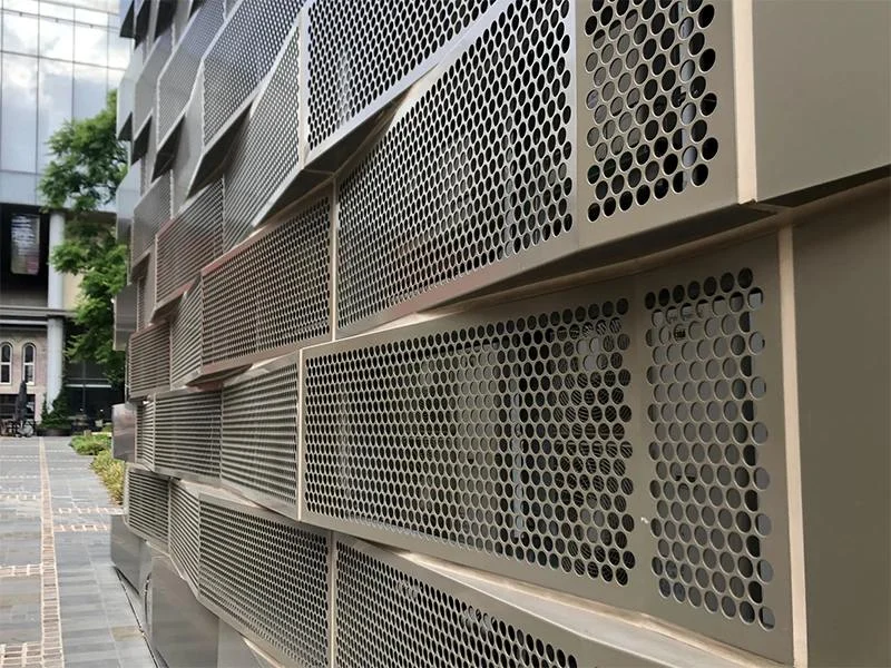 Perforated architectural panel cut from stainless