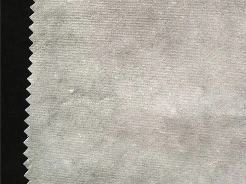 Thin upholstery backing held flat on vacuum and cut with the face layer on the MNT C-series