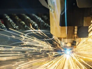 Fiber laser cutting head in operation