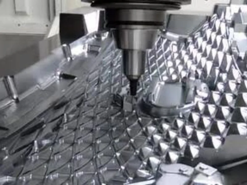 Drilling perpendicular to a curved surface on a five axis router