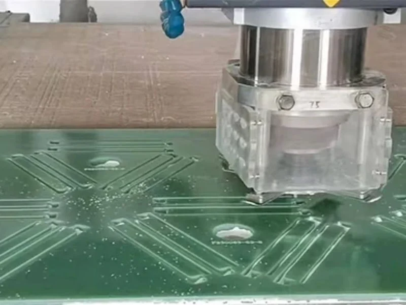 Machined G10 laminate cutting template with drilled locating holes