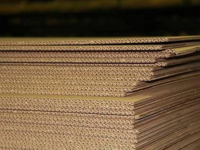 Corrugated board creased and cut on a knife table