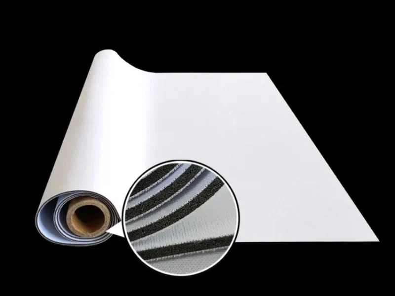 Nylon-faced neoprene laminate cut with facing and core sheared together on the MNT C-series