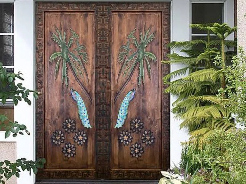 Relief-carved panel on a decorative entry door