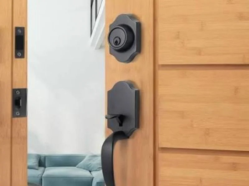 Lockset cross bore drilled through the face of a door leaf