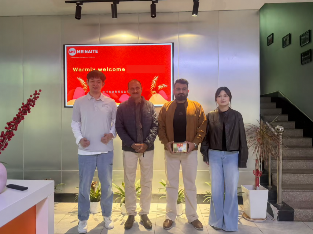 Indian customer team visiting MNT in Hangzhou; customer name concealed on the welcome screen